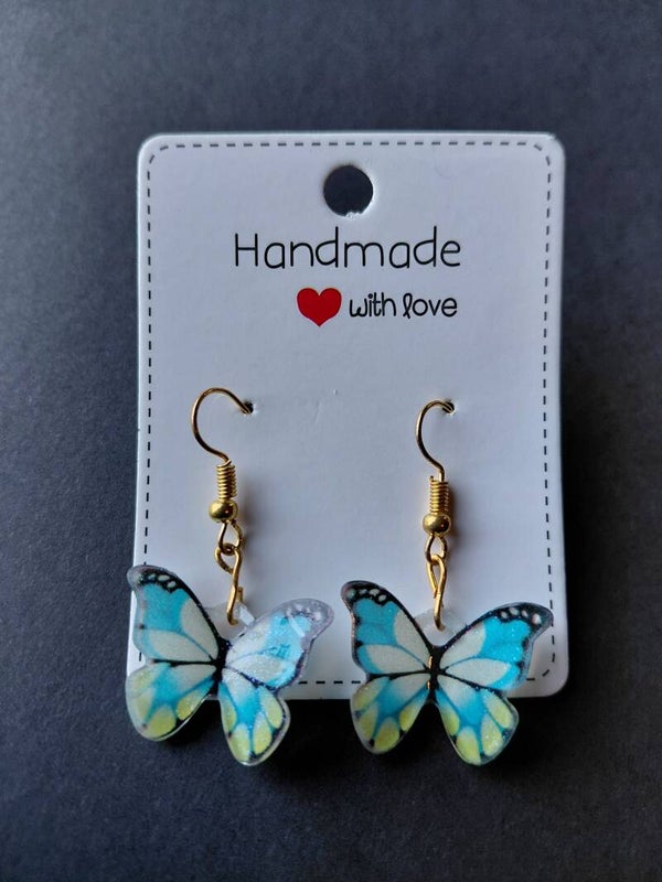 Handgemaakte vlinder oorbellen – blauw & geel 🦋
