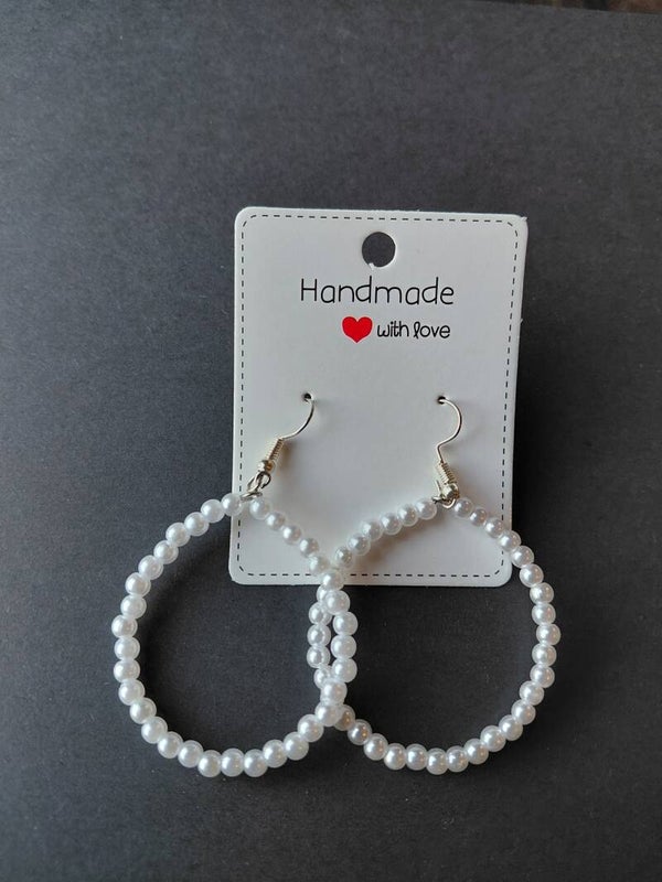 Handgemaakte pareloorbellen – elegant & tijdloos