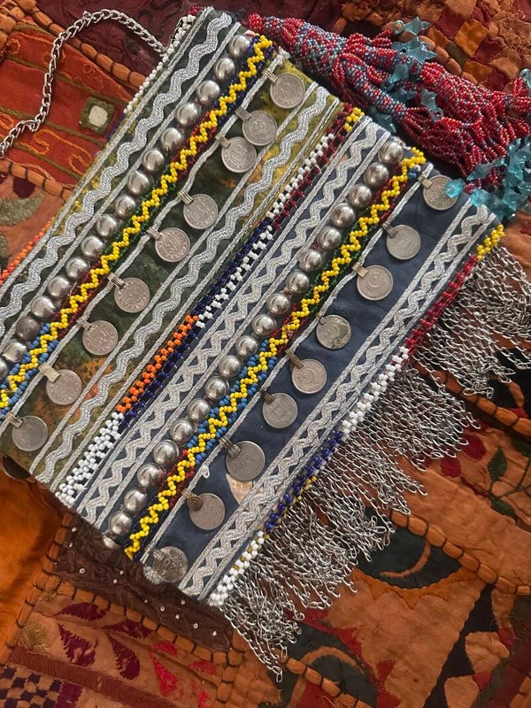 Nomad coin clutch
