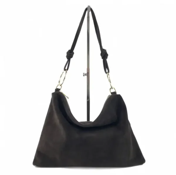 SUEDE TAS met grote gouden ring. Kleur: Donker bruin Materiaal: Kalfsleer made in Italy Maat: 36x26x1cm