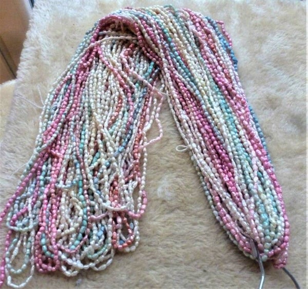 Lange parelketting prijs per stuk,