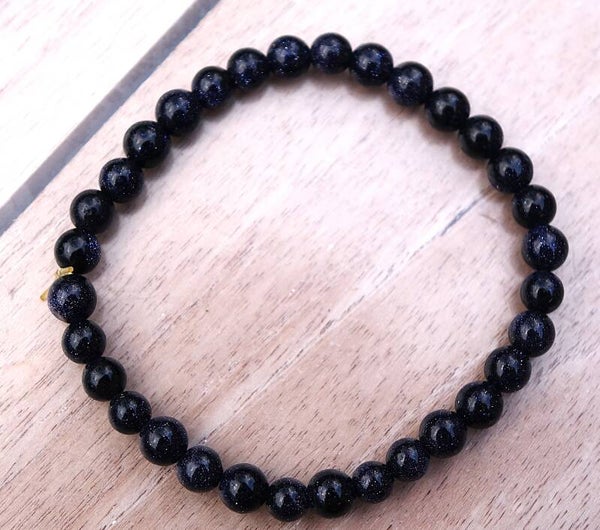 Mooie Armband van Paarse Goudsteen .
