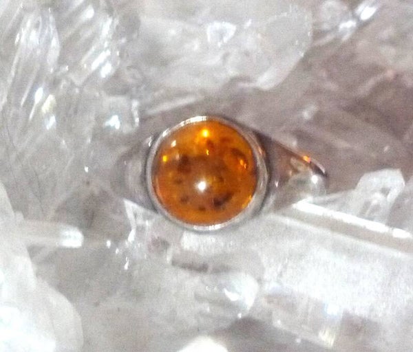 Mooie kinder ring met barnsteen en 925 zilver