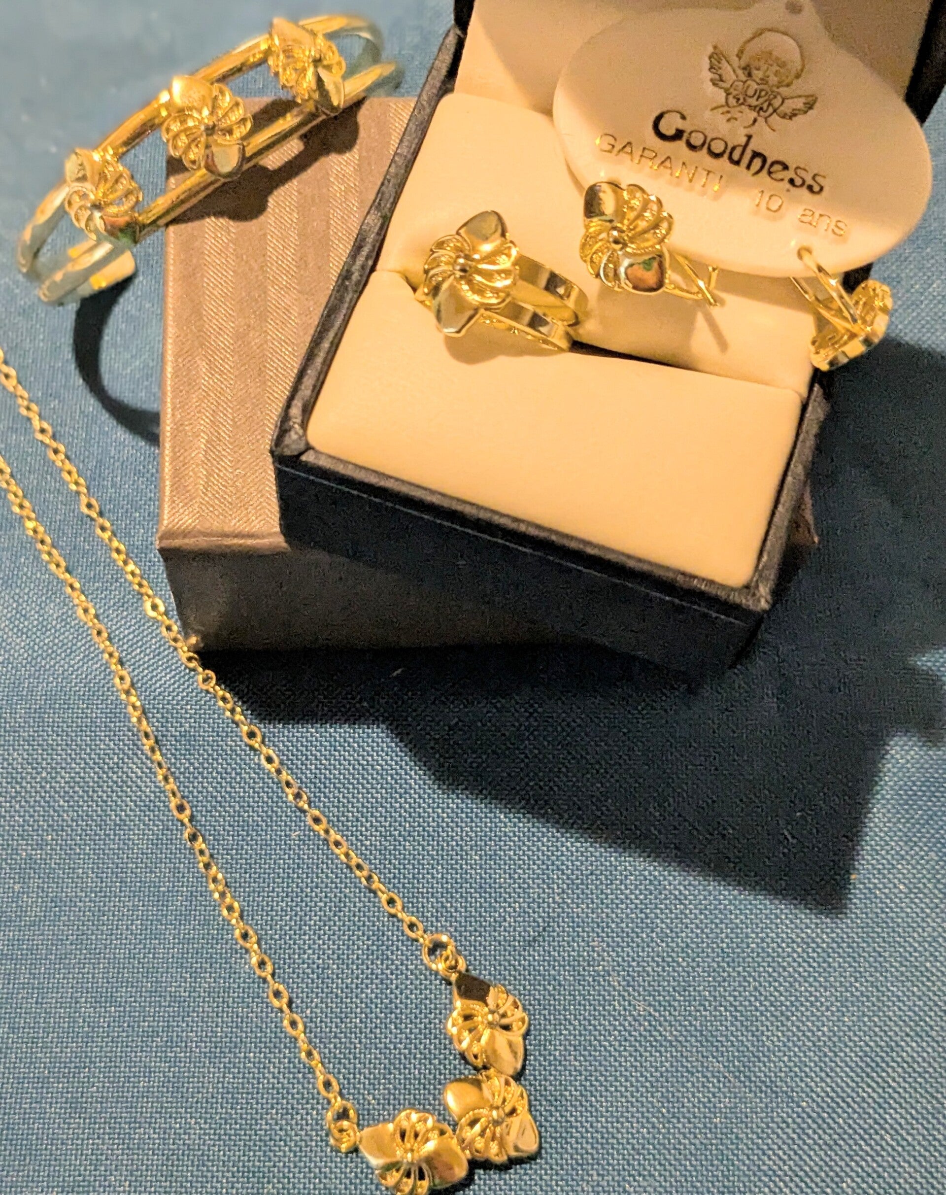 Girls Gold Plated Necklace, Earrings, Ring and Bracelet with Beautiful  Design on an Oval