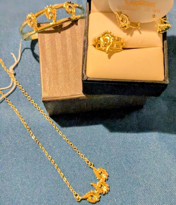 Girls Gold Plated Necklace, Earrings, Ring and Bracelet with Beautiful  Feather Like Design