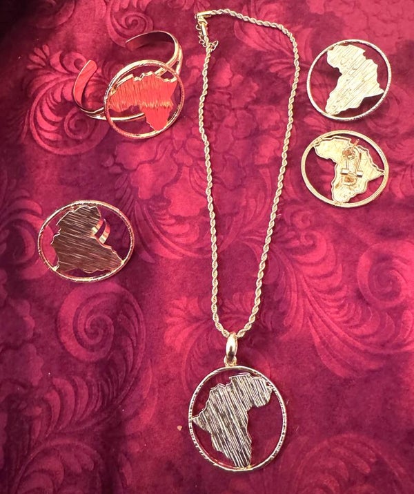 Womans Gold Plated Necklace, Earrings, Ring and Bracelet with Beautiful African Design