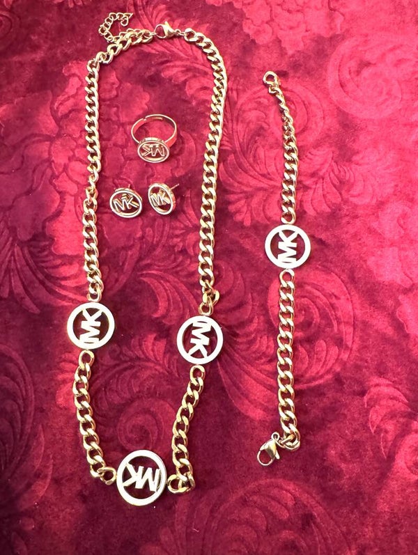 Womans Gold Plated Necklace, Earrings, Ring and Bracelet with Beautiful MK Design