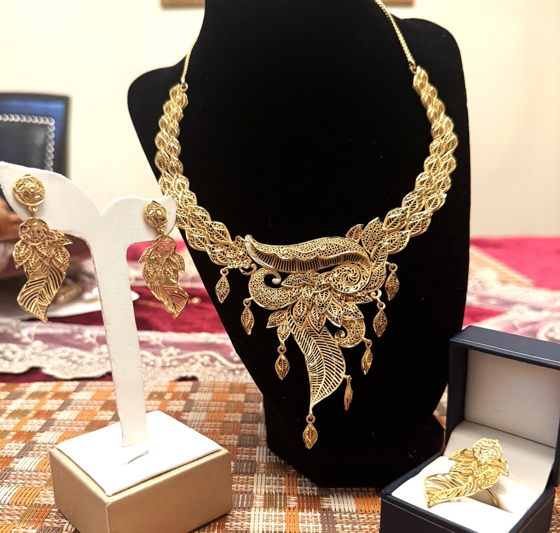 Beautiful Gold Tone Large Necklace, Ring and Earrings with Layers of Different Pattern Flowers/Leafs and Dangling Leafs