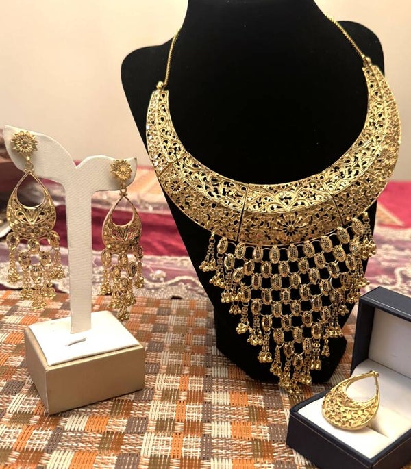 Beautiful Gold Tone Large Necklace, Ring,and Earrings with Designs that Dangle off Necklace