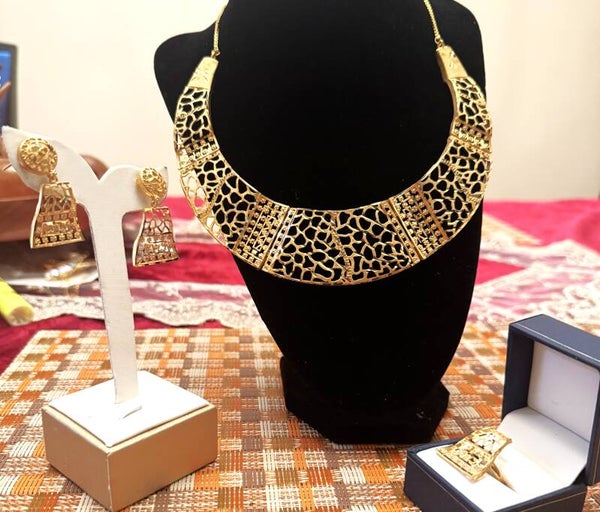 Beautiful Gold Tone Large Necklace, Ring, and Earrings with Cheetah like and Small Flower Design