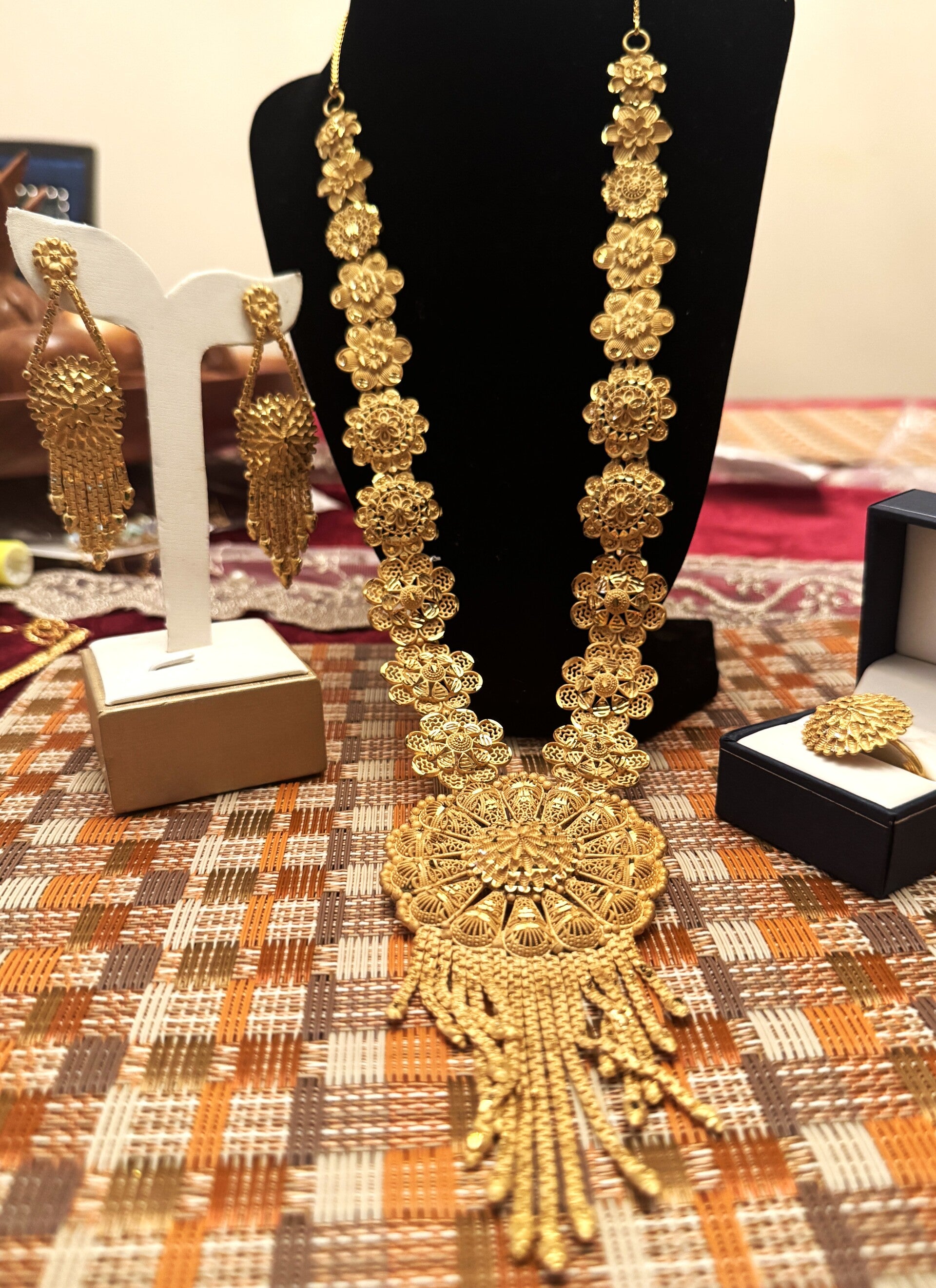 Beautiful Gold Tone Long Necklace, Ring, and Earrings with Elegant Indian Like Flower Design