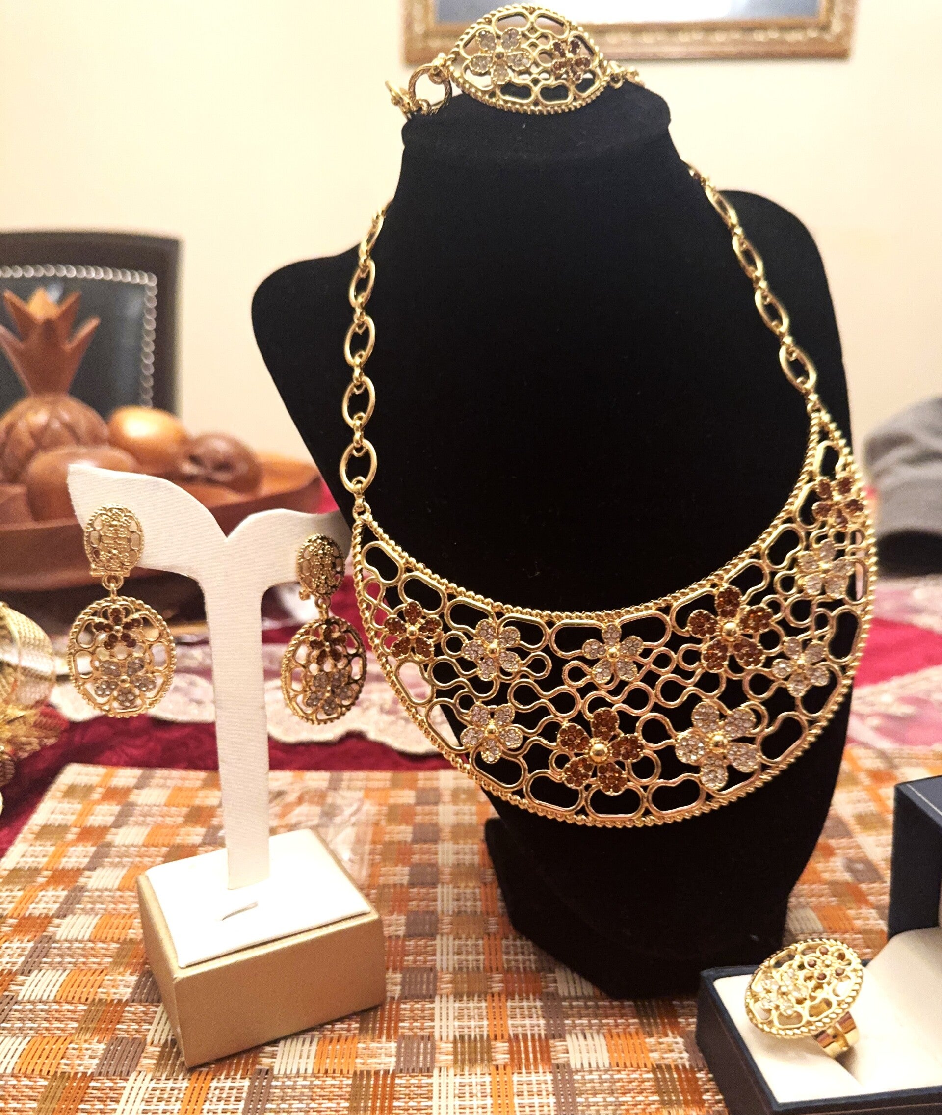 Beautiful Women Gold Tone Necklace, Bracelet, Ring and Earrings with Flowers on top of Design. Brown and White CZ Stones in Flower