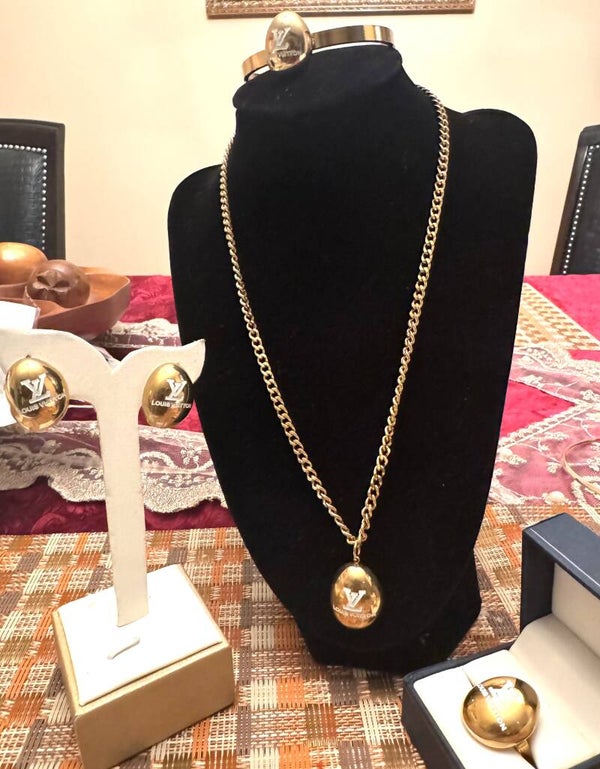 Beautiful Gold Color Necklace, Bracelet, Ring and Earrings With White LV Like Style Design