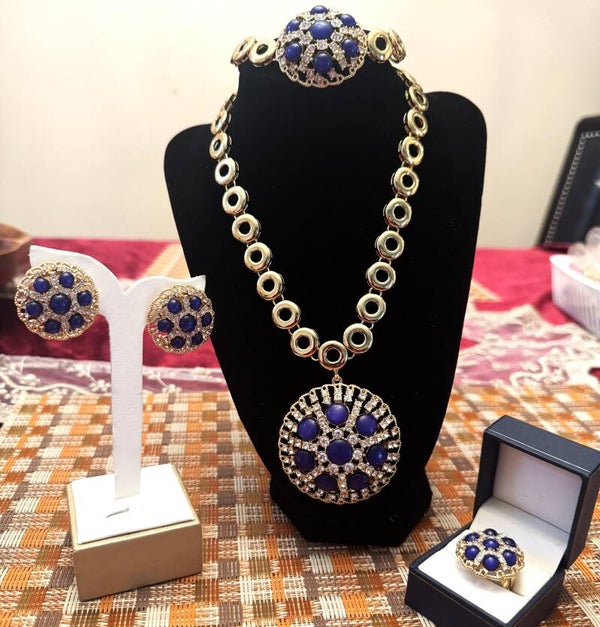 Beautiful Gold Tone Necklace. Bracelet, Ring and Earrings