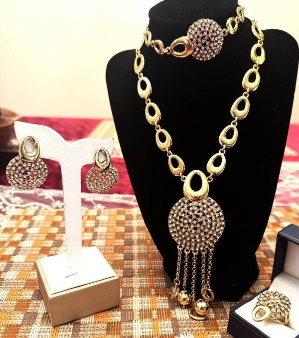 Beautiful Gold Tone Necklace, Bracelet. Ring and Earrings With White Stones and Large Circles with Dangly Chains