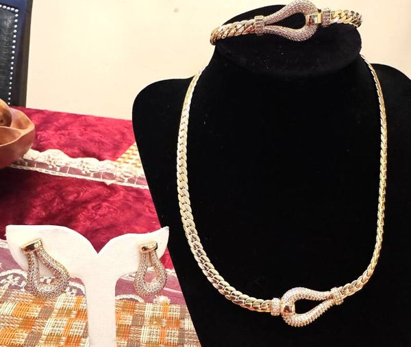 Beautiful Gold Tone Necklace, Bracelet and Earrings Link Design With White Stones In Horse Buckle Design