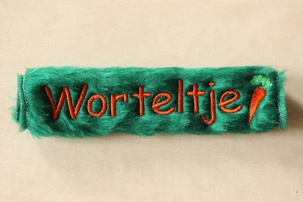 Neusbontje met tekst + wortel