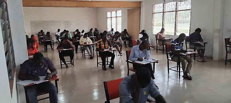 Students taking exam.