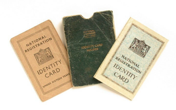National Registration Identity Cards, plus holder.