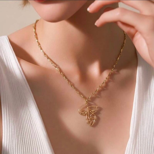 The Gold Face necklace
