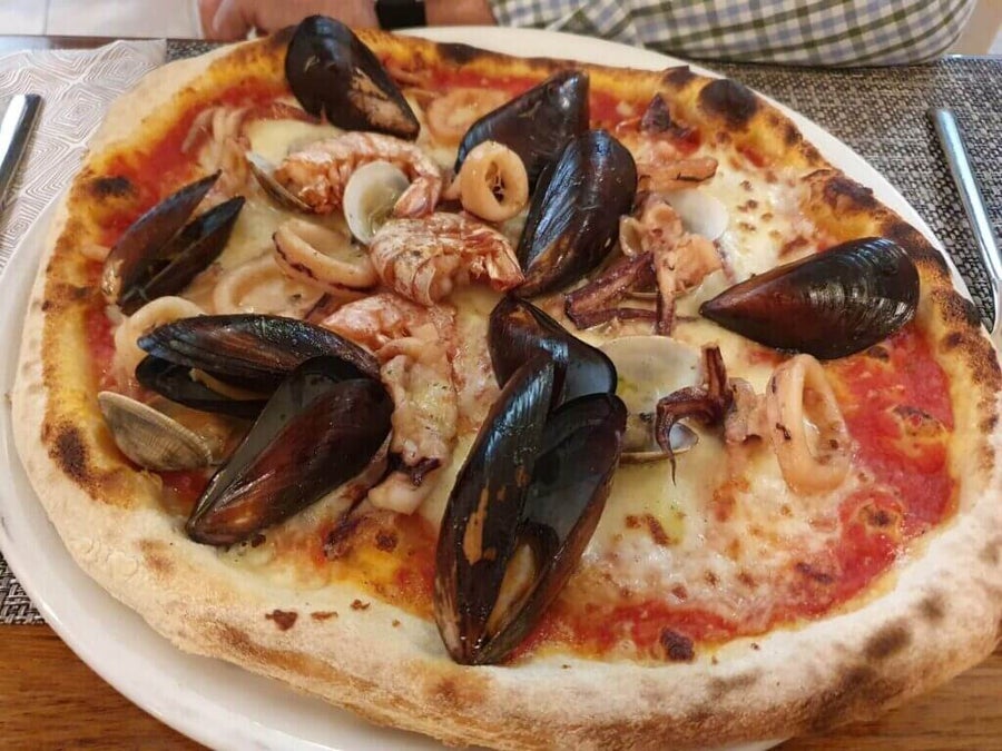 Gastronomía en Capo Testa: sabores del mar y la tierra