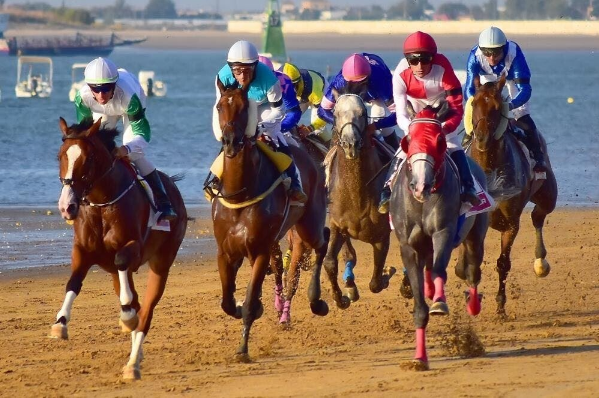 Carrera de caballos en la playa de san lucar de barrameda