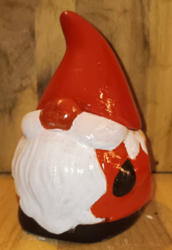 Weihnachtsmann mit Kerze