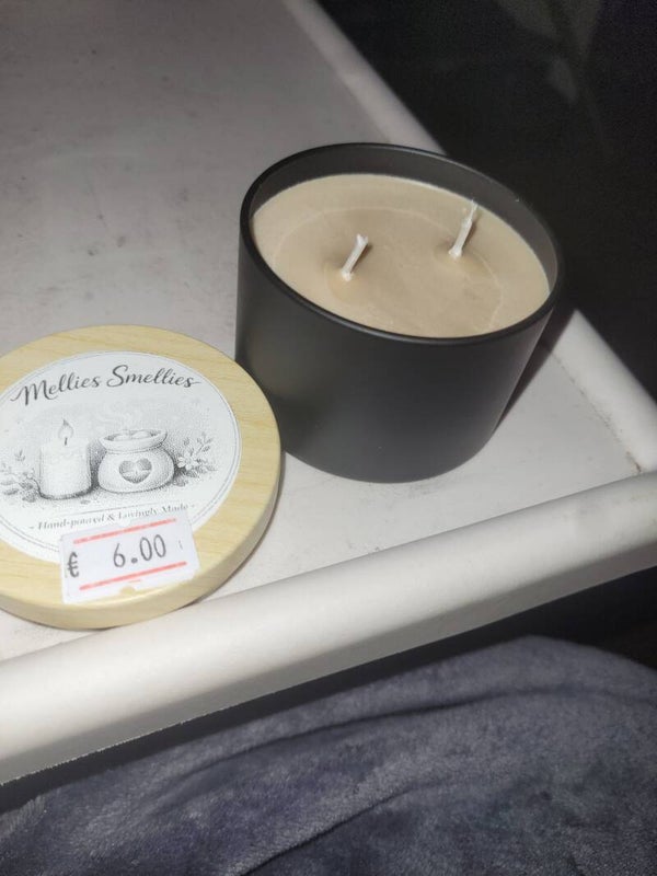 Small scented black container candle