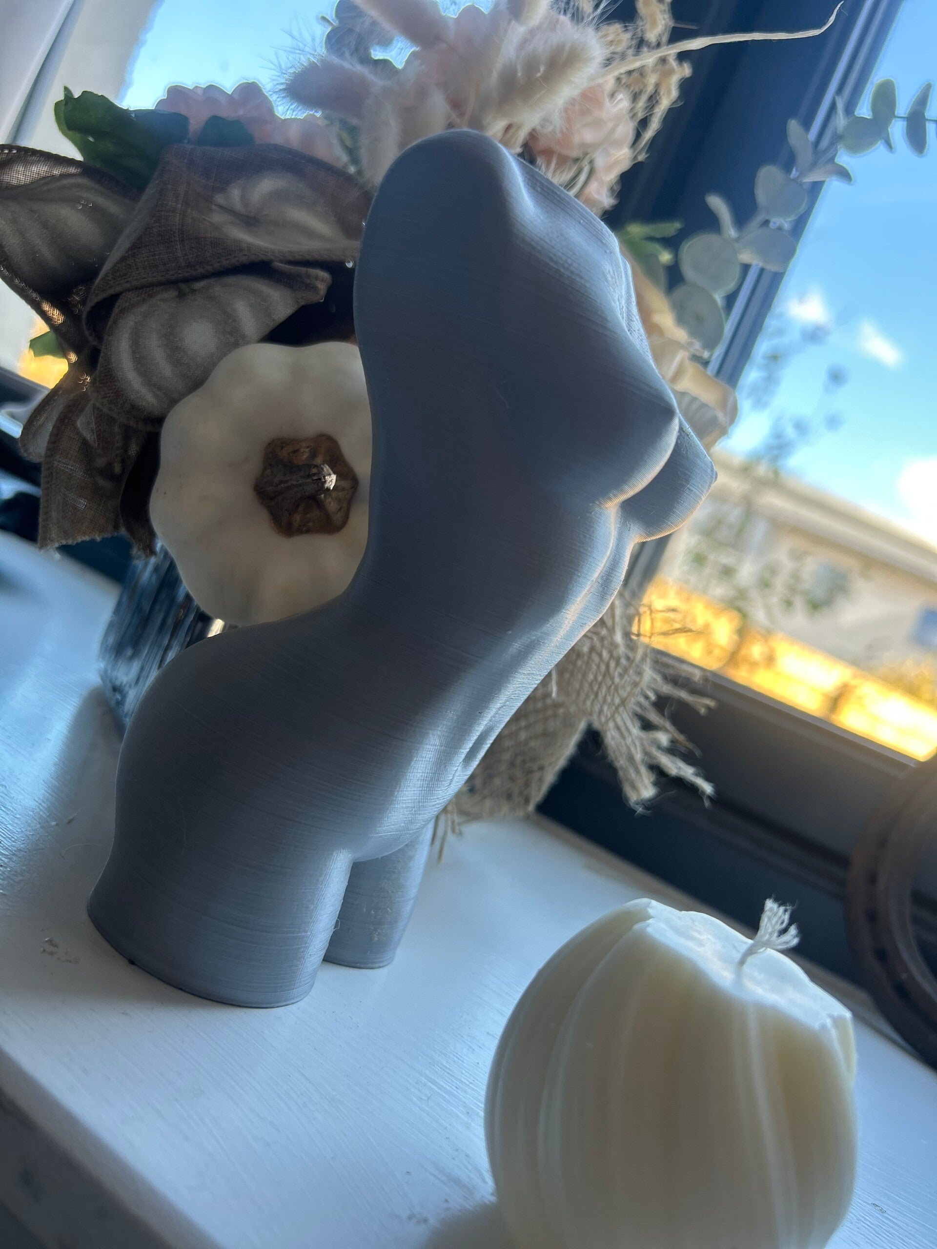 Woman’s torso ornament