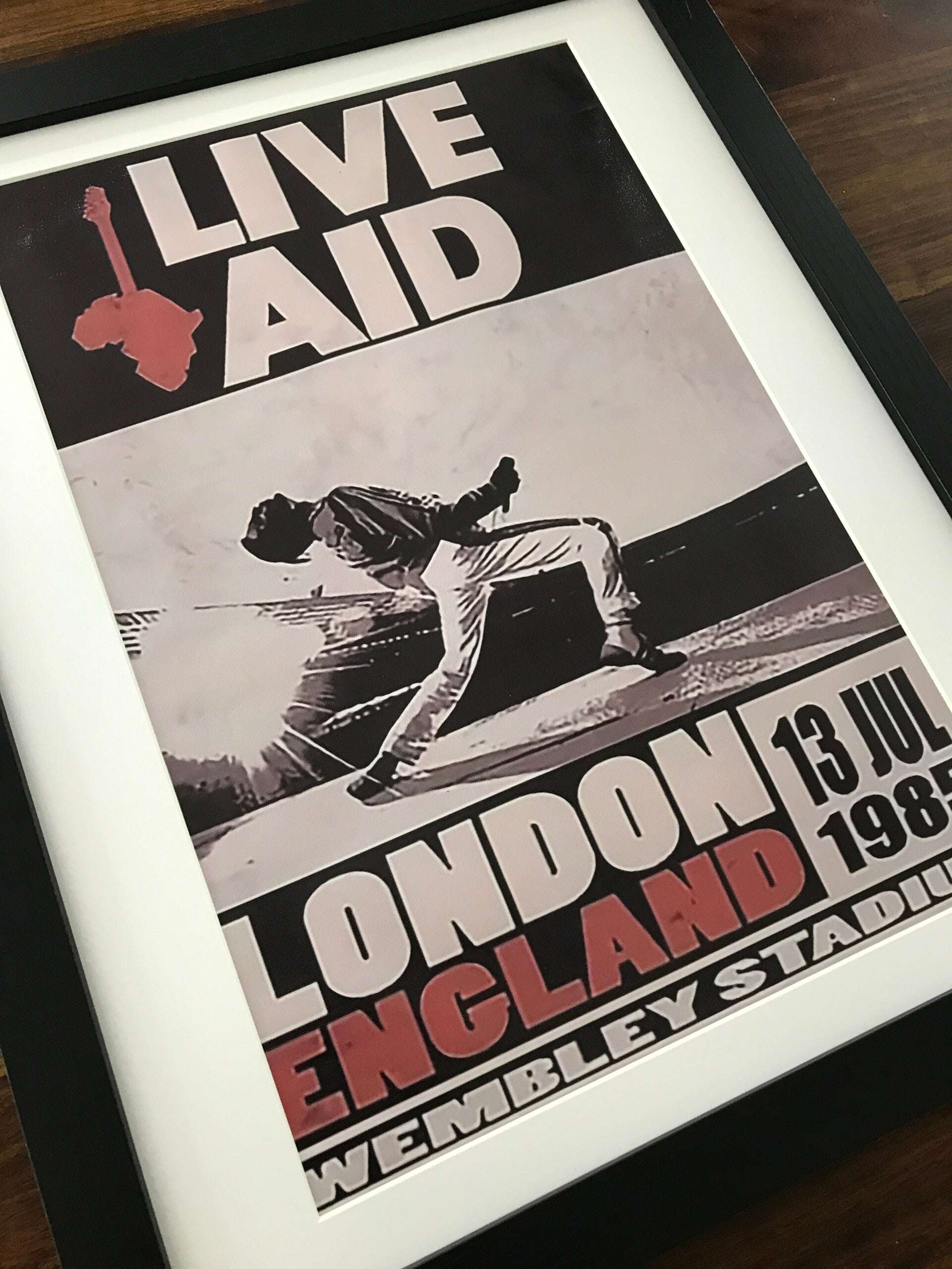 Queen - Live Aid Framed Canvas Print