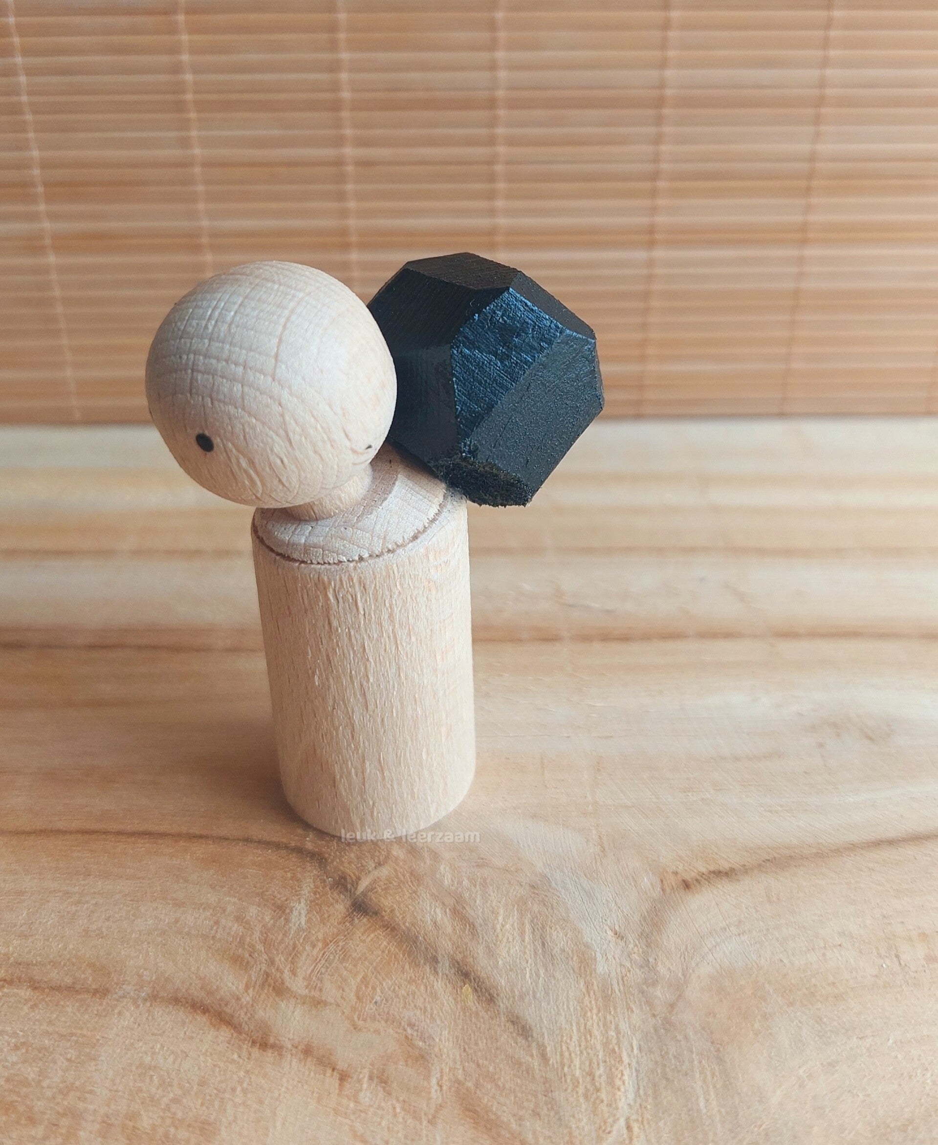 Poppetje met "steen"