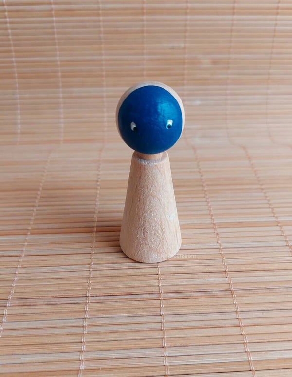 Houten poppetje met masker