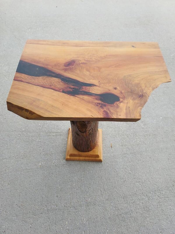 Live edge cypress side table with single log leg - Raw edge. Bold leg. Pure statement