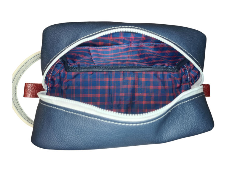Trousse de toilette en cuirs bleu blanc rouge ouverte, interieur tissu imperméable rouge et bleu
