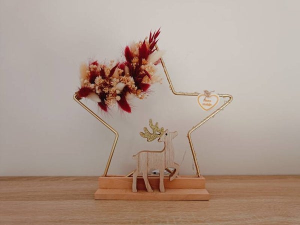 Gouden ster met rendier