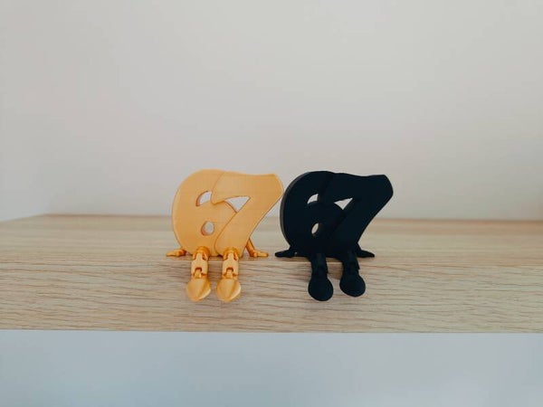 3D zittend figuurtje '67'