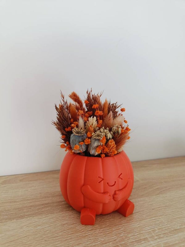 3D zittend pompoentje oranje met droogbloemen