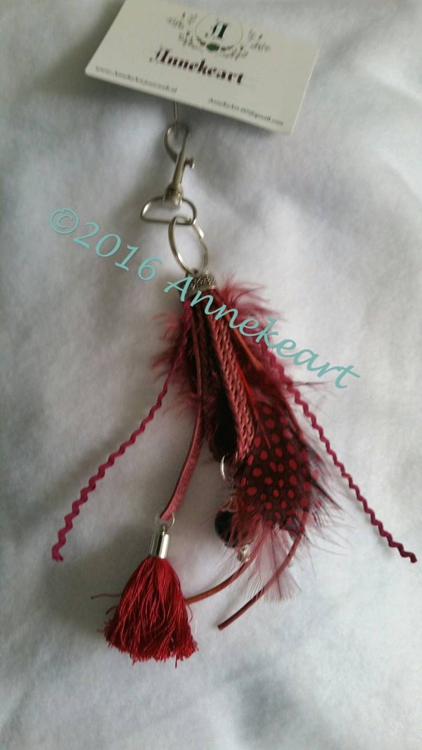 Sleutel/tas hanger 6.