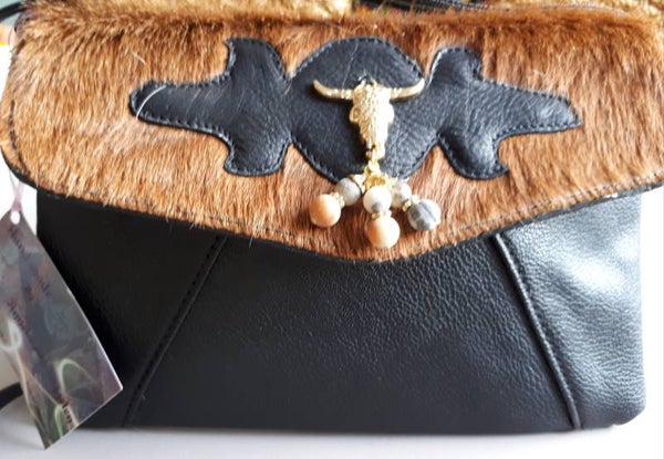 Tasje met koeienvacht 8.a