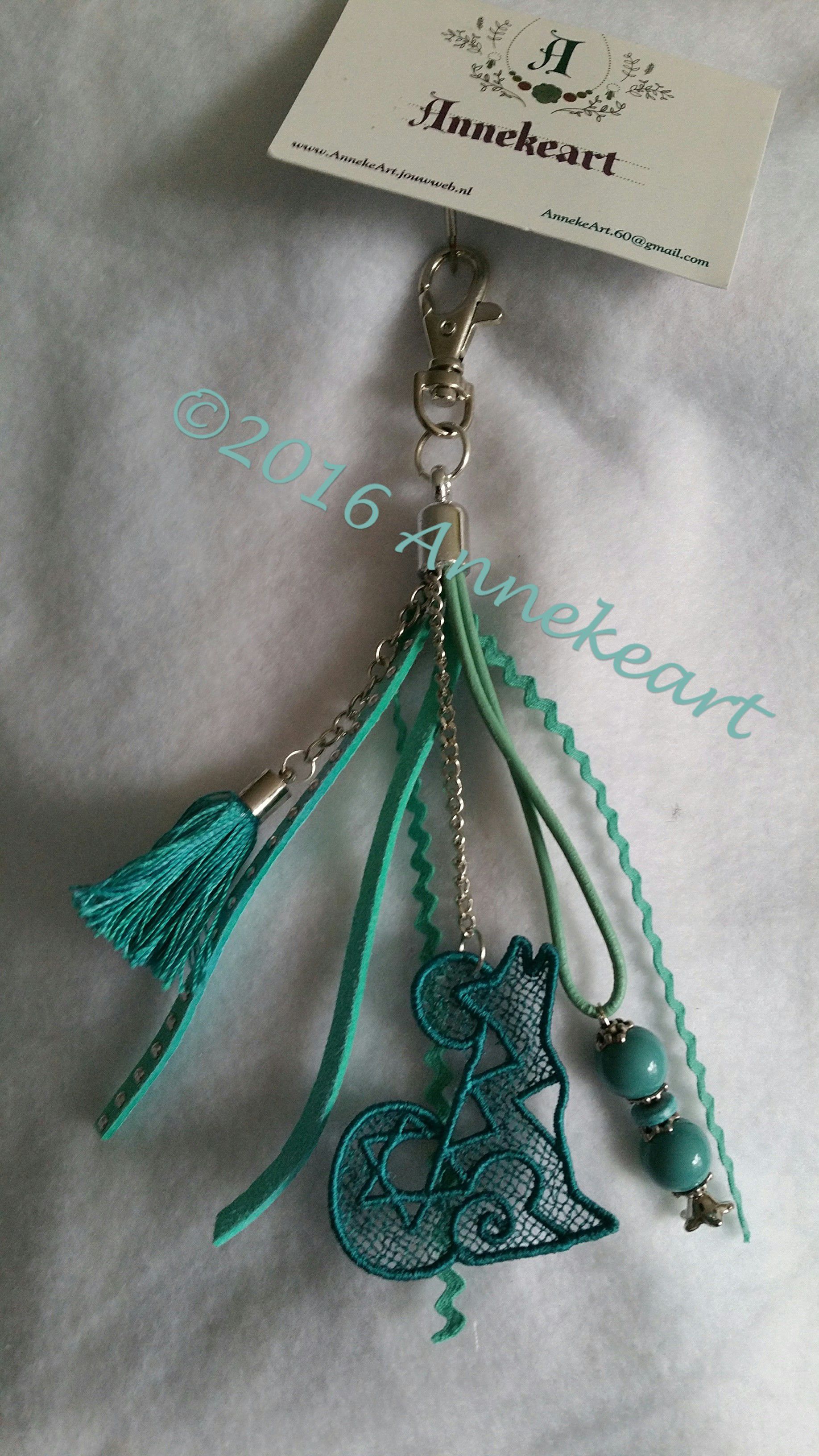 Sleutel/tas hanger  7.