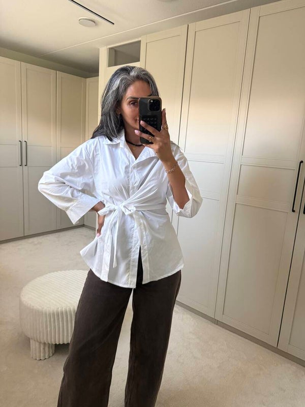 Witte blouse strik