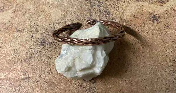 Gevlochten,gehamerd en rond model (koperen armband)