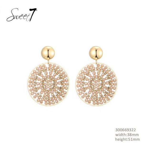 Oorbellen rond l Beige