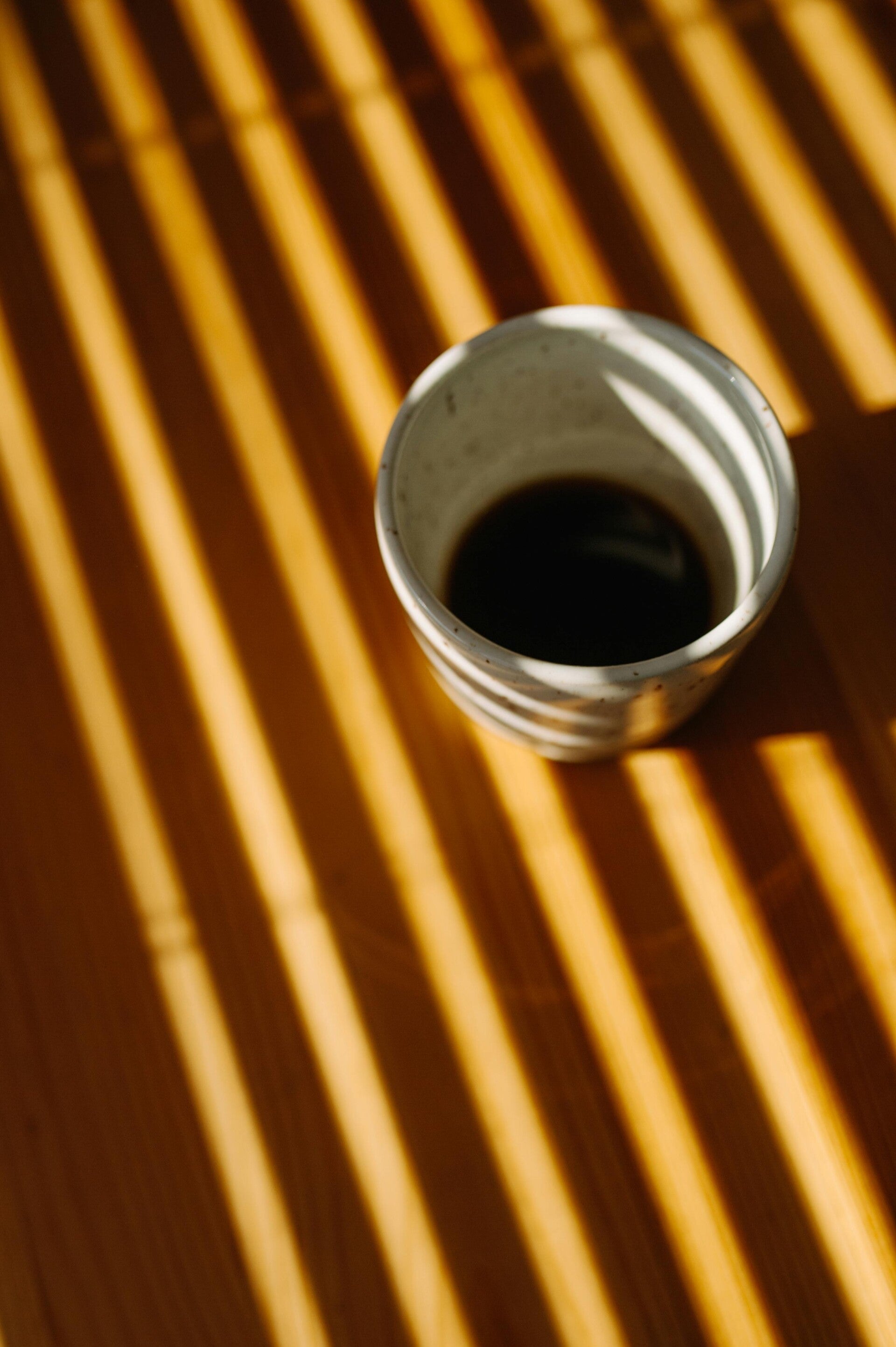 Coffee cup in sunshine