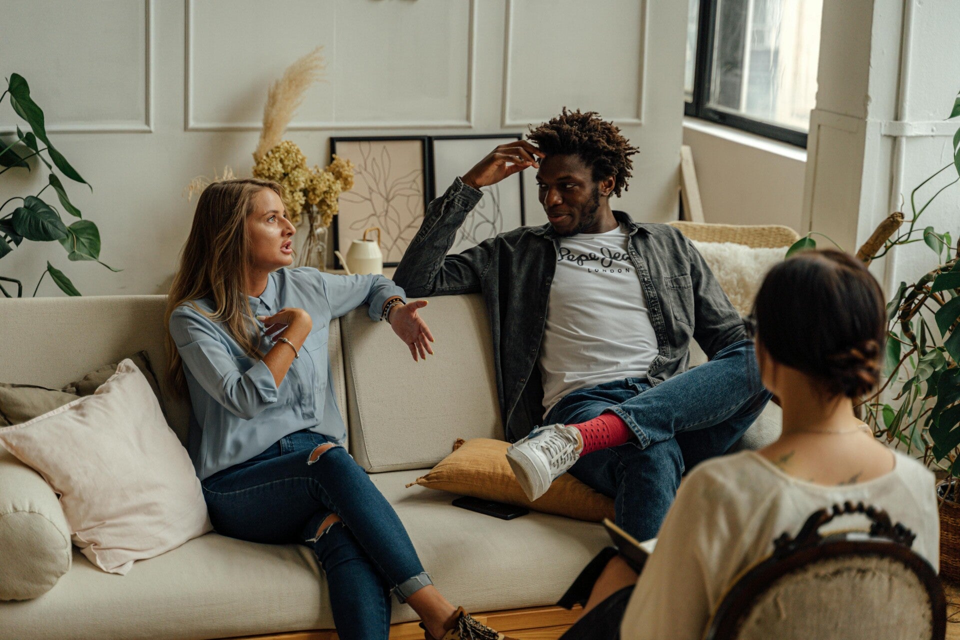 Couple talking in therapist office