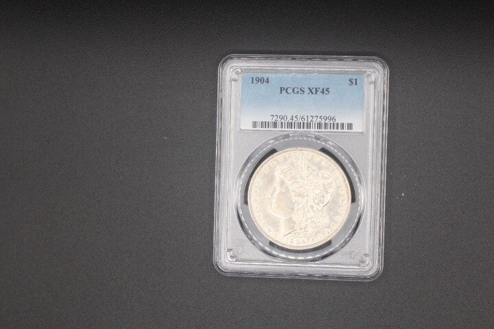 1$ - Morgan - 1904 in PCGS Coin Flip - XF45