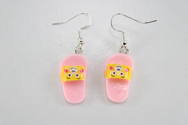 1Badslipper Met Gezicht Divers - Oorbellen