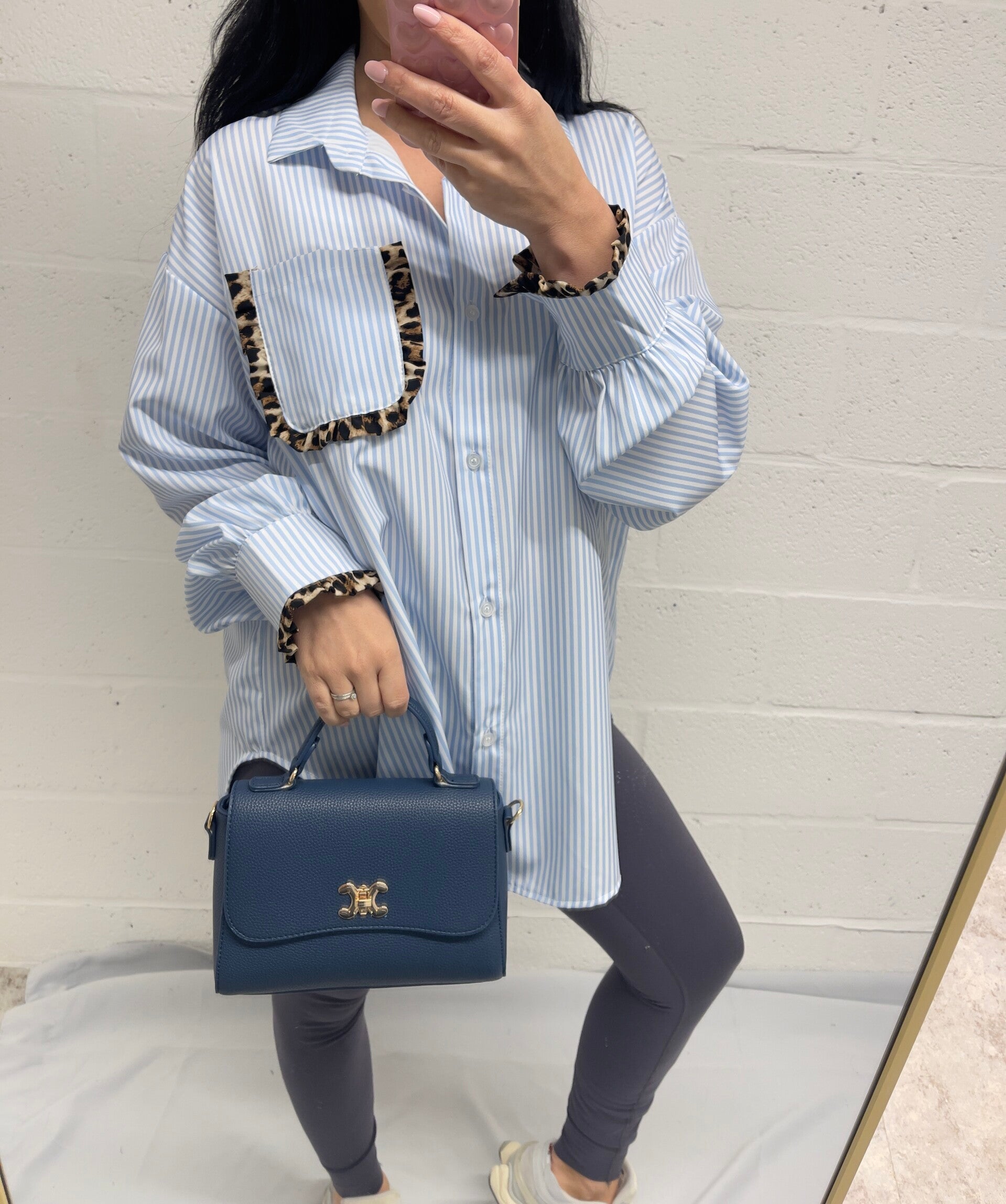 Gestreepte oversized blouse met panter detail