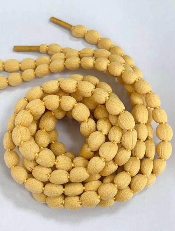 Veters - bolletjes - okergeel