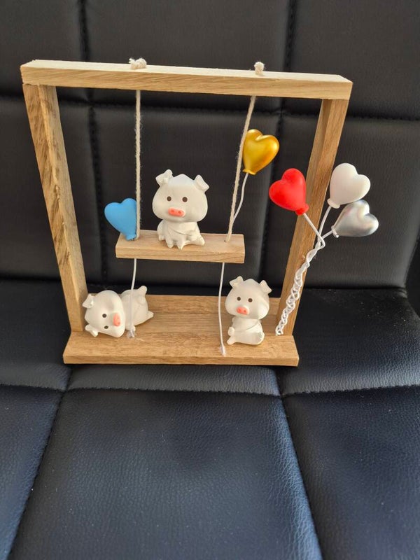 Drei spielende Schweinchen